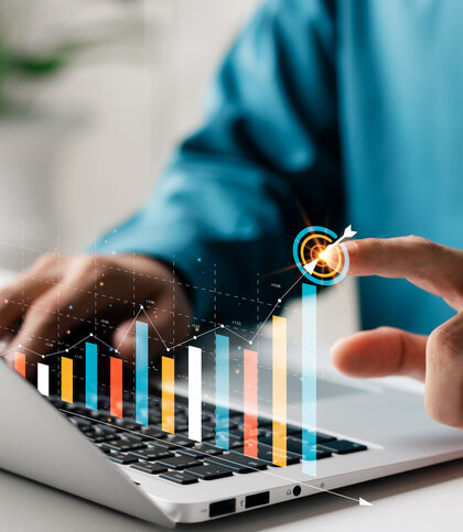 Businessman analyzing company's financial balance sheet working with digital augmented reality graphics. Businessman calculates financial data for long-term investment. Businessman analyzing company's financial balance sheet working with digital augmented reality graphics. Businessman calculates financial data for long-term investment.